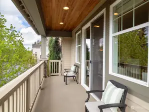 Indulge in the scenic beauty of Sammamish Valley from the comfort of your covered deck