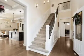 Step inside the elegance of this home- vaulted ceilings, engineered hardwood floors, leaded glass from door with close attention to detailed millwork.