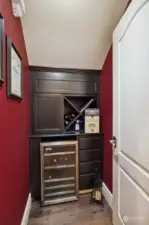Under the stairs wine closet!