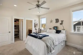 One of the two bedrooms located upstairs- attaches to the Jack & Jill bathroom and features a large walk-in closet!
