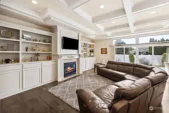 Extensive custom cabinetry with lots of area for games.