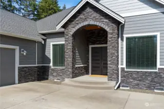 Enter thru the stone entry with 8ft. French Doors and get ready to be "WOWED"!
