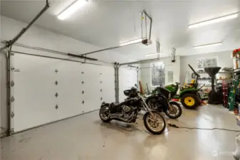 Spacious 3 car garage has room for all of the toys and has an epoxied floor!