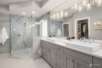 Lavish primary bathroom with heated floors and extended shower