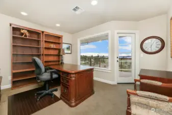 2nd floor office with over sized deck and west view of the sound, ferry traffic, and mountain range