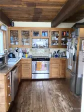 Casual kitchen has cabin vibe