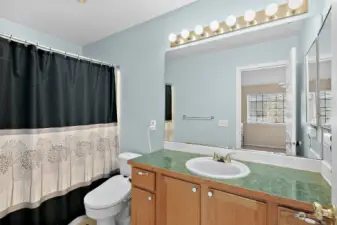 Private Primary bathroom with shower/tub combo.