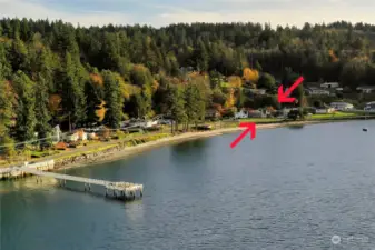 Waterman dock in the foreground and the arrows point to the property, showing proximity to the public dock.