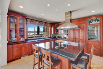 Kitchen with granite countertops and cherry cabinets