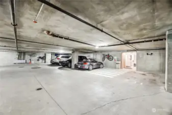Two parking spaces convey with the unit!  #231 and #235.  Both spaces are large and provide a rack for bike storage.  Don't need 2 spaces?  Rent out one!  The car wash area is located in the back of the frame.