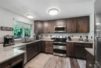 The remodeled kitchen features a high end appliance package.