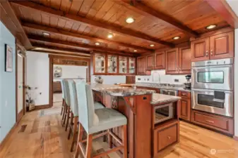 A professional chef designed and works in this kitchen. The expansive of granite counter tops are a great workspace for everyday meals to party time feasts.