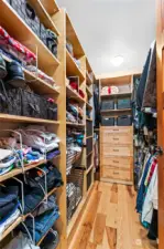 Your walk in closet features drawers, bins, pullout baskets and lots of shelving along with the double stack hanging rods.