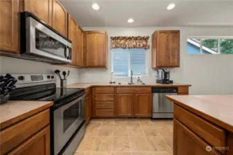Fully equipped kitchen with sleek stainless steel appliances and offers ample counter and storage space, providing both style and practicality for your culinary adventures. (gas available)