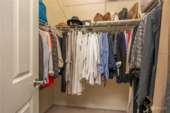 Walk-in closet, complete with double-shelving for organized storage of your wardrobe essentials.