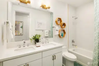 Full main hall bathroom with dual sink vanity