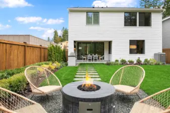 Relax in the backyard around your built in firepit