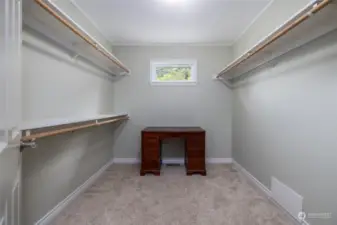 Primary bedroom features a large walk-in closet