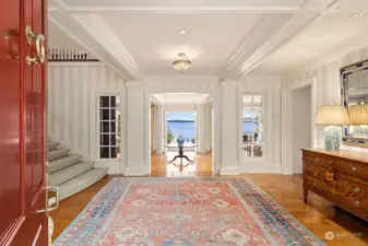 The minute you walk in the door you'll experience exquisite craftsmanship and rich, cultivated beauty. Take in the classically detailed axial foyer leading to a columned central bay and the gorgeous views beyond.