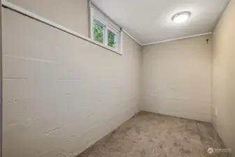 Small room would be great for a work out space or for great storage.
