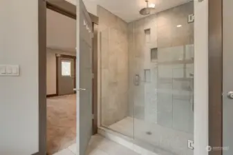 Walk in tile shower with luxurious waterfall shower head
