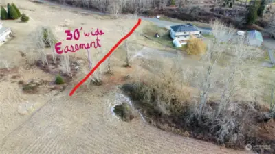 This shows where the 30' easement runs for road access to your property.