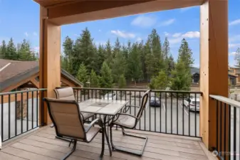 Enjoy a morning cup of coffee on your covered deck as you take in the fresh mountain air.