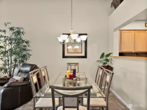 Ample space to entertain in this open formal dining area.
