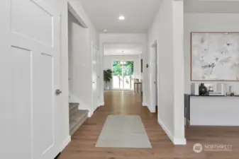 Virtually staged photo of entry way from same plan on different lot, for reference only