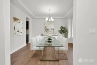Virtually staged photo of dining room from same plan on different lot, for reference only