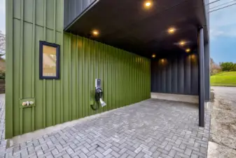 Parking is conveniently provided with one carport with car charging station, adding to the property's appeal.