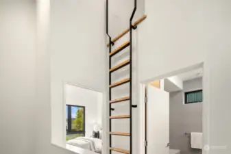 The architectural ladder to the bonus loft provides a modern and stylish touch, adding both functionality and visual interest to the space.