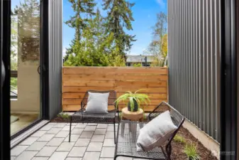 The front patio is nestled off the dining and living areas, making it the perfect spot for a grill, al fresco dining, or to relax after a long day.