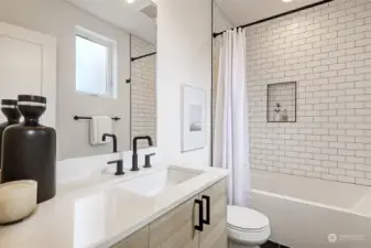 Lower Level Full Bath with custom tile.