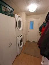 Mud room with stacked washer/dryer