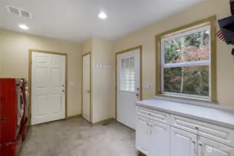 Laundry room leads you to the 3-car garage and deck!