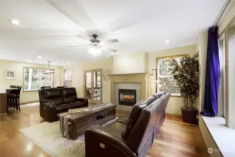 The living room hosts a propane fireplace and Brazilian Cherry floors.