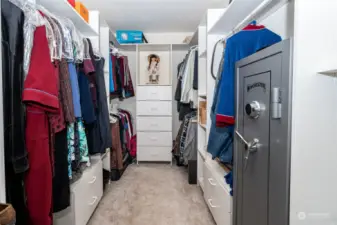 Large walk-in closet with plenty of storage.