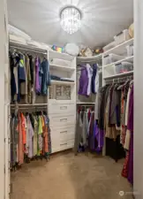 Custom closet system in primary bedroom