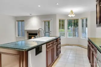 View from Kitchen out to backyard, breakfast nook for your morning coffee. Tile floors in kitchen makes cleanup a breeze!