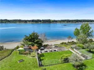 Let your cares float away! You'll be part owner of this private beach with picnic tables, BBQ, fire pit, and kayak storage and dock!!