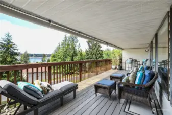 Just off the Living Rm and Dining Rm is this fabulous deck! Imagine relaxing after a long day and taking in the Sound view...