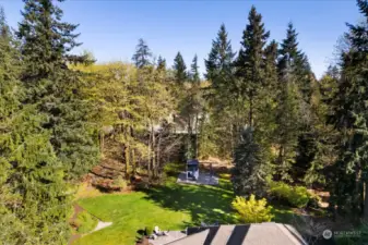 1.75 acre lot with beatuful lawn and forest trails that are yours