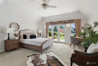 Indulge in luxury living with the main floor primary bedroom, boasting all the amenities of a five-star hotel including a walk-in tile shower, jetted soaking tub, high airy ceiling, and private deck access