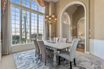 Enjoy dinner parties in this spacious and elegant formal dining room. Stunning floor to ceiling windows.
