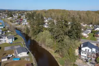 Spectacular western views with sunsets, Terrell Creek bordering property, central location to public beaches, Birch Bay State Park, boating, plus water activities including kayaking with creek to bay access.