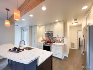Beautifully updated modern kitchen with Silestone counter top