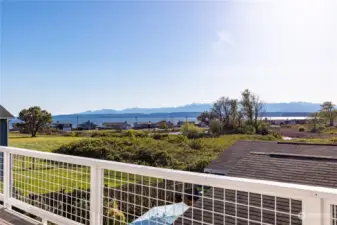 Imagine waking up and walking out on your deck without leaving your bedroom. Soak up the sun and these expansive views of shipping lanes, gorgeous mountains, and ever-changing skylines.