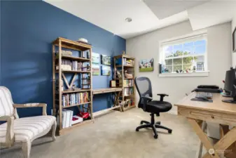 Another bonus room downstairs is perfect for your home office, or...