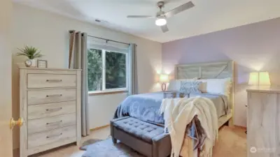Retreat to the Primary bedroom oasis that overlooks the peaceful greenbelt with a connecting bathroom and a closest organization system.